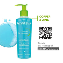 Foaming gel cleanser bottle with green pump, copper & zinc info and QR code