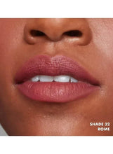 Matte berry lipstick on lips, shade 32 Rome displayed