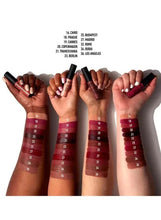 Assorted NYX soft matte lip creams in hand, shade range with 32 Rome