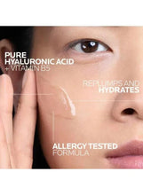 Clear serum being applied to face with white dropper; Hyalu B5 bottle shown