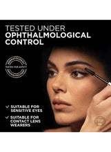 Mascara wand near eye with dermatology testing badge