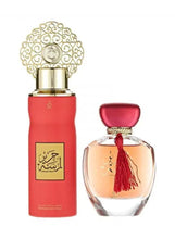 Fragrance gift set with red glass EDP bottle and round perfume bottle with gold cap