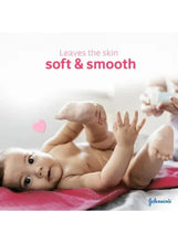 Baby being massaged with Johnson’s baby oil, soft and smooth