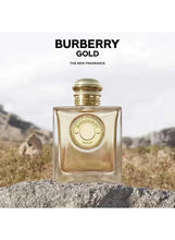 Eau de parfum glass bottle with gold cap and Burberry Gold emblem