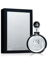 Eau de parfum bottle with black cap and silver round label, shown with gift box