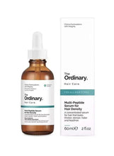 The Ordinary multi-peptide hair density serum bottle and box, amber glass and white cap