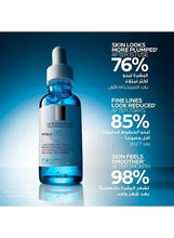 Blue serum bottle with dropper, clear blue liquid visible in transparent vial