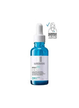 Serum dropper bottle in blue glass with white cap and label