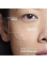 Face close-up with lightweight serum benefit boxes on cheek and eye area