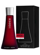 Red eau de parfum bottle with silver cap beside Deep Red presentation box