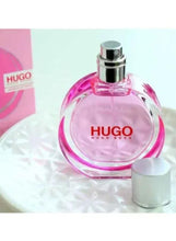 HUGO Extreme eau de parfum bottle with pink glass and silver spray cap