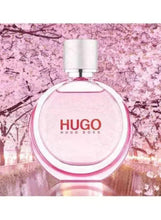 HUGO Extreme eau de parfum bottle, pink glass with HUGO label