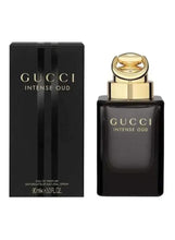 Black perfume box with Gucci Intense Oud and 90ml EDP label
