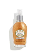 Almond shimmering body oil bottle with pump, amber-gold liquid, 100 ml