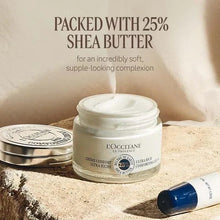 Face cream jar with white cream inside and silver lid beside it.