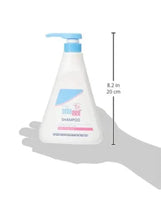 Baby shampoo bottle with blue pump, shown at 8.2 in height