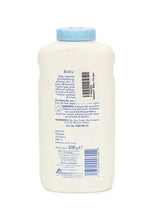 Baby powder bottle with blue cap and back label with barcode