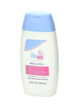 Sebamed baby body lotion bottle with light blue cap and cream label