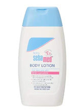 Sebamed baby body lotion bottle with blue cap and chamomile label