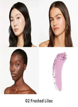 Frosted lilac highlighter shade shown on faces and with a purple swatch