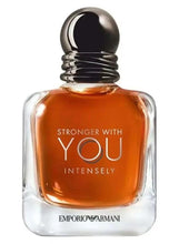 Perfume bottle close-up, dark round cap, amber liquid, Stronger With You Intense