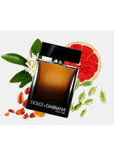 Men's eau de parfum bottle with amber liquid and black rectangular cap