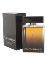 Men's eau de parfum bottle with black base and amber liquid, with gift box