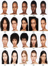 Gucci Glow skin tint shade range chart with multiple face swatches and numbers