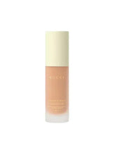 Foundation bottle with light beige cap and fair-medium liquid shade