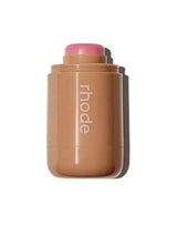 Pocket blush stick in tan tube with pink cap and RHODE logo