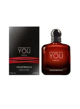 Men's eau de parfum bottle with red glass and dark cap, with matching retail box