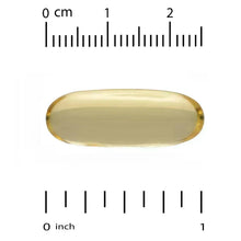 Yellow softgel capsule with measurement scale above and beside the capsule.