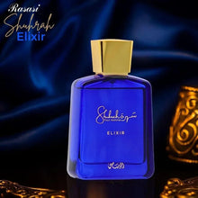 Rasasi Shuhrah Elixir blue bottle with gold square cap and front label