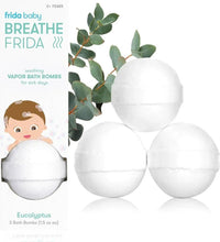 Set of three white vapor bath bombs with eucalyptus leaves.