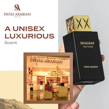 Shaghaf Oud Aswad 75 ml Eau de Parfum box held by hand, black and gold cap