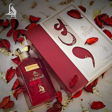 Eau de parfum bottle and matching box with gold Arabic calligraphy