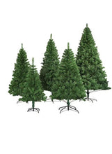 Set of artificial Christmas trees, multiple lush green pine silhouettes with metal bases