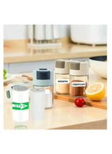Thermal label rolls in desktop dispensers with condiment label print samples