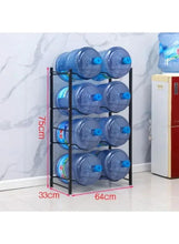 Black four-layer bottle storage rack holding several blue water bottles in rows