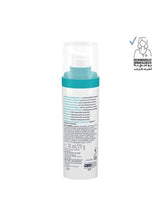 Teal-and-white skincare bottle with back label text visible