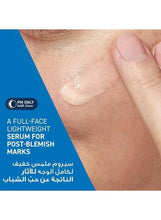 Skin close-up with light gel sheen and small blemish spot