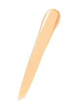 Neutral beige concealer swatch on applicator tip