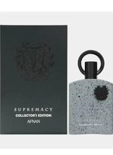 Perfume gift set: dark box and speckled 100 ml eau de parfum bottle with ring cap