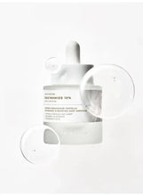 Niacinamide serum ampoule bottle with dropper, circular magnified label