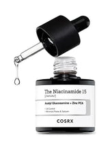 Niacinamide 15 serum bottle with black dropper, dispensing clear liquid