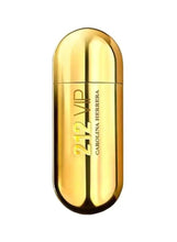 Carolina Herrera 212 VIP perfume bottle, metallic gold oval with vertical label