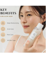 Woman holding toner bottle; key benefits panel for glow skin is visible