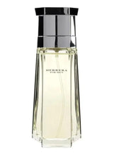 Men's eau de toilette spray bottle with dark cap, clear glass, Carolina Herrera