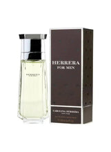 Men's eau de toilette spray bottle beside Carolina Herrera 100ml box with dark panel