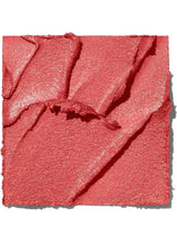 Glimmering guava makeup swatch in sparkly coral-pink